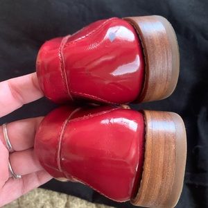Bass Weejins red patent penny loafers.